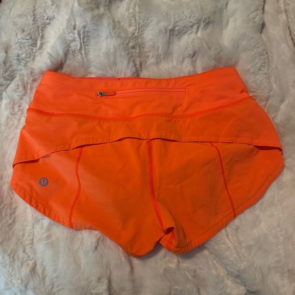 Lululemon Orange Soda Speed ups.